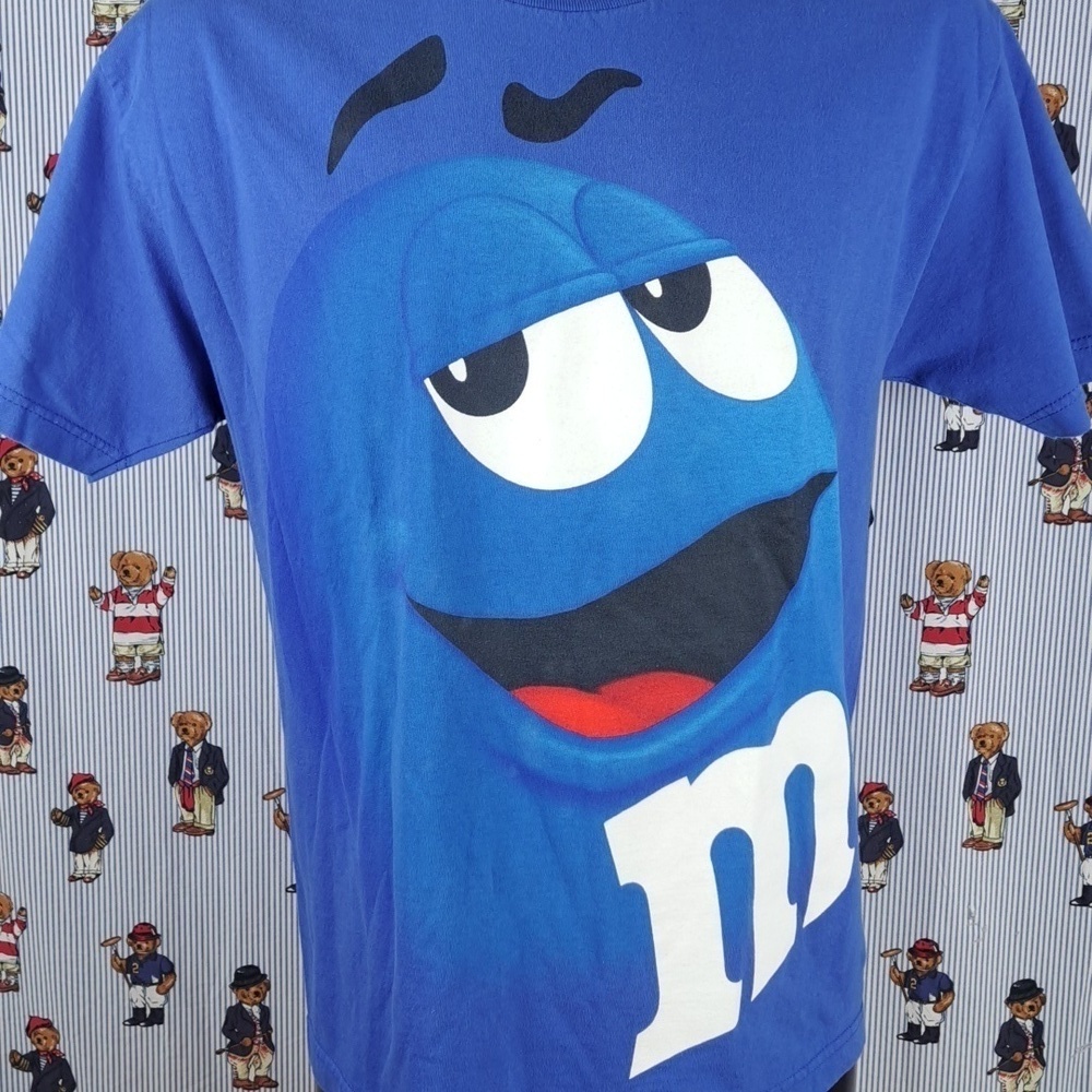 Y2K Blue Almond 2M&M candy big smiley face graphic AOP blue & white XL t-shirt